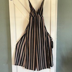 Dark blue stripped romper with slits on the side size medium